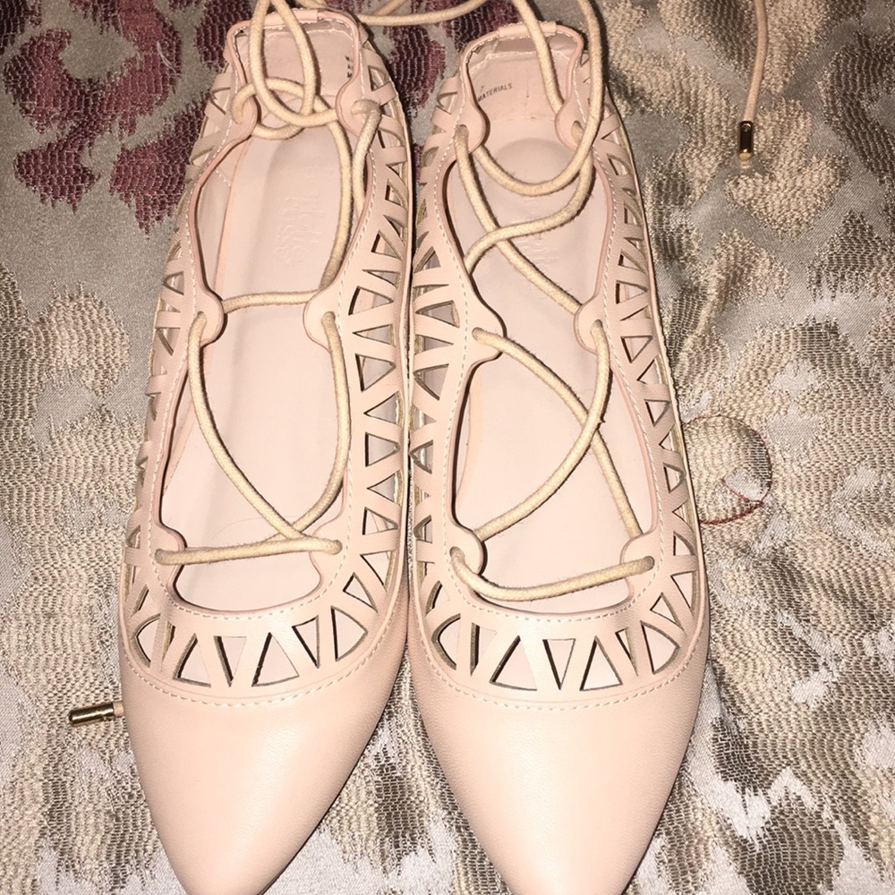 Nice clean pink flat shoes for a party.